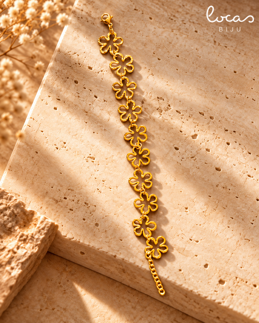 Pulseira LIRIA dourada em aço inoxidável com elos em forma de flor